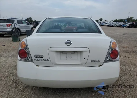 2002 Nissan Altima Base из США, поврежденный, VIN 1N4AL11D52C133685